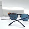 CALVIN KLEIN Blue Oval Sunglasses